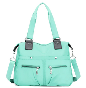 Bolsa feminina impermeável Myla onlivix + chaveiro de brinde